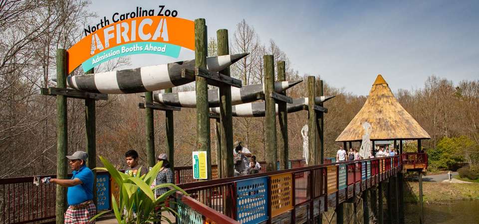 Guests at the Africa Bridge Entrance of the North Carolina Zoo.